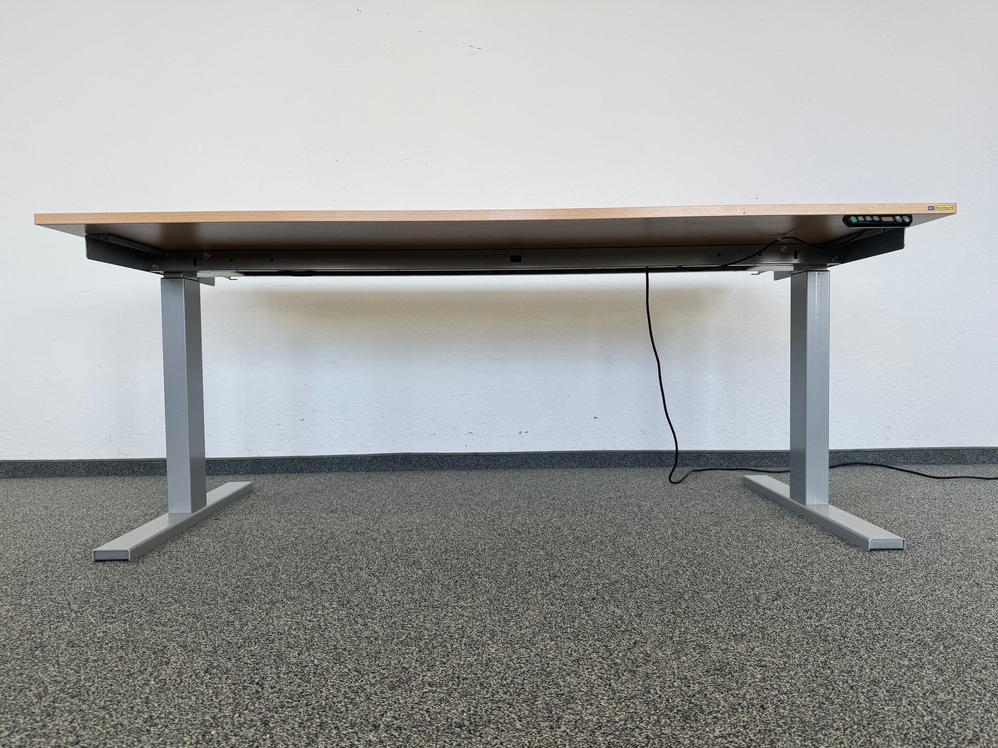 Interoffice Sitz-Steh-Schreibtisch von unten